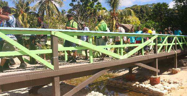 Guests walking on Rara village foot walk bridge after the official opening. Guests walking on Rara village foot walk bridge after the official opening.